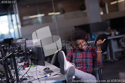 Image of portrait of a young successful African-American woman in modern 