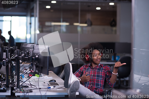 Image of portrait of a young successful African-American woman in modern 