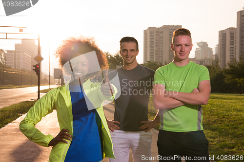 Image of portrait multiethnic group of people on the jogging