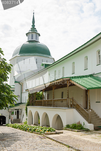 Image of Sergiev Posad - August 10, 2015: View of the water tower and the wall adjacent to it on the part of the temple of the Holy Trinity - St. Sergius Lavra in Sergiev Posad