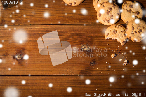 Image of close up of oat cookies on wooden table