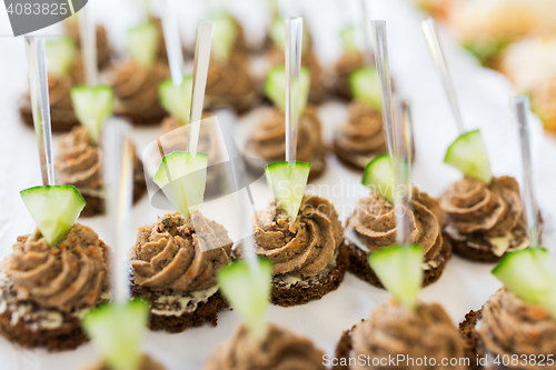 Image of close up of canape with paste on serving tray