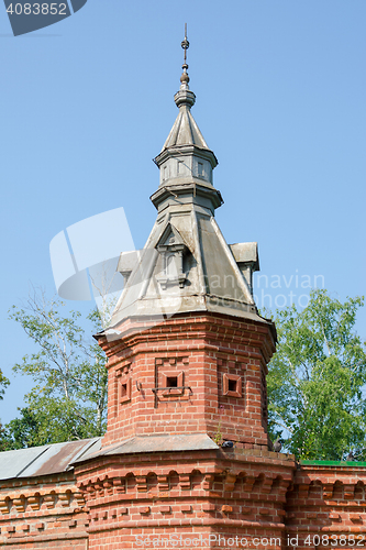 Image of Sergiev Posad - August 10, 2015: the tower on the red wall extending from retail shops around Pafnutevskom garden at the Trinity-Sergius Lavra