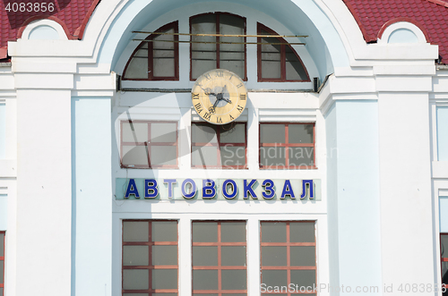 Image of Sergiev Posad - August 10, 2015: Caption bus station and watch over it, on the building of the central bus station of the Moscow city Sergiev Posad