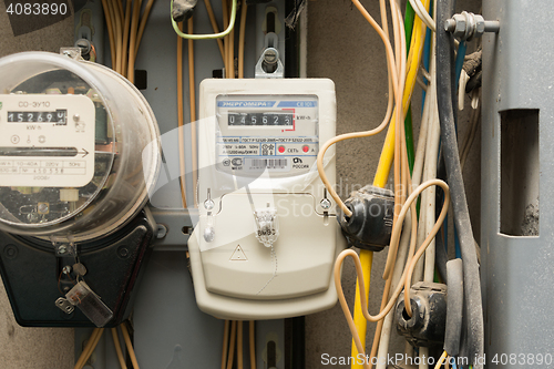 Image of Volgograd, Russia - October 10, 2016: Electronic electric meter electricity company \"Energomera\", close to a mechanical counter