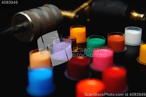 Image of tattoo ink on the background of a  machine