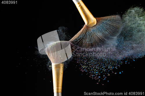 Image of Cosmetical splash of powder from the special brushes