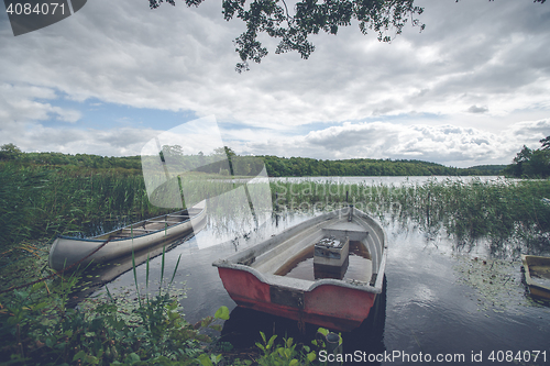 Image of Idyllic lake with a small boat 