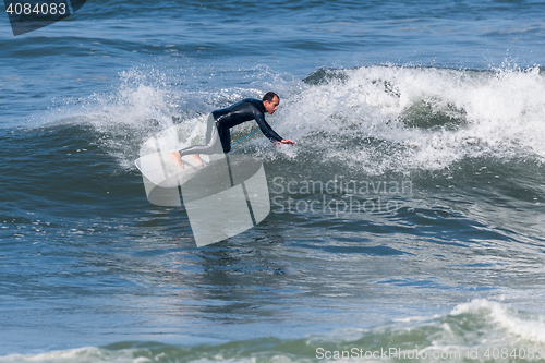 Image of Surfing the waves