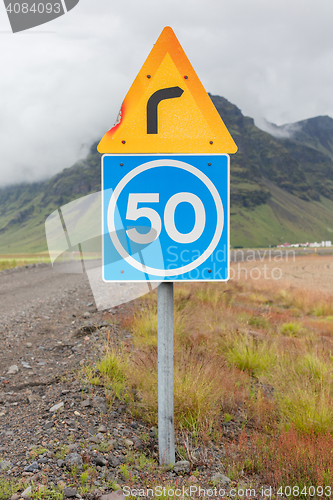 Image of Curve with advisory speed limit