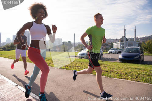 Image of multiethnic group of people on the jogging