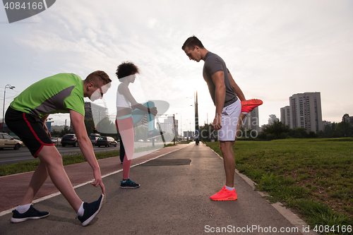 Image of multiethnic group of people on the jogging
