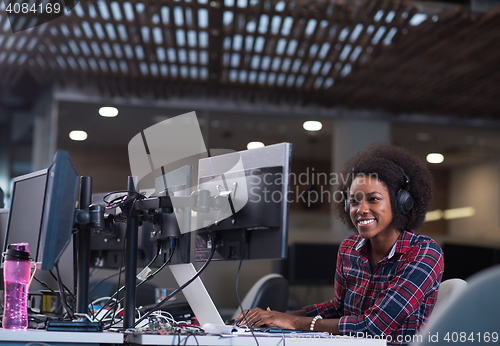 Image of portrait of a young successful African-American woman in modern 