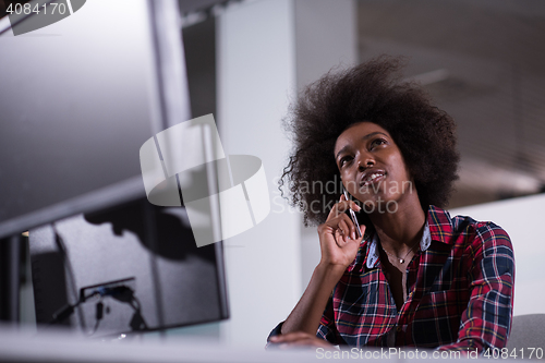 Image of portrait of a young successful African-American woman in modern 