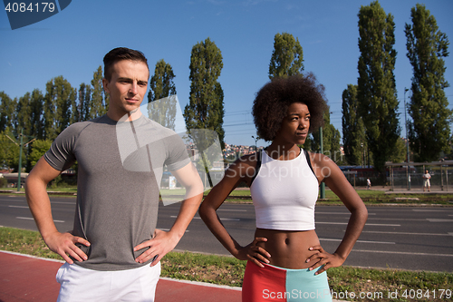 Image of Portrait of romantic pretty couple on fitness session, outside t