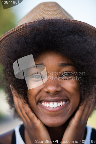 Image of Close up portrait of a beautiful young african american woman sm