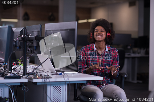 Image of portrait of a young successful African-American woman in modern 