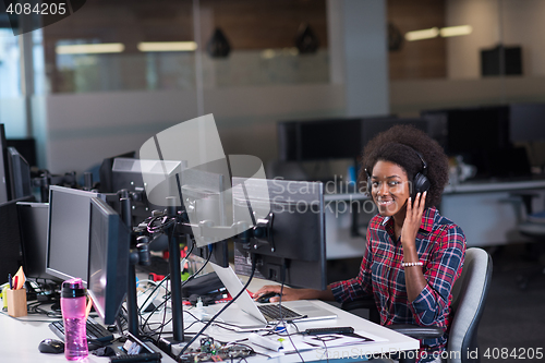 Image of portrait of a young successful African-American woman in modern 