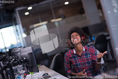 Image of portrait of a young successful African-American woman in modern 