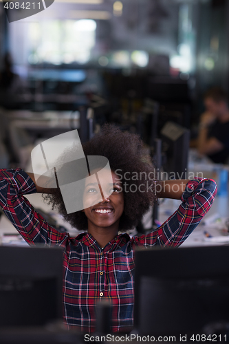 Image of portrait of a young successful African-American woman in modern 