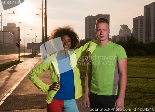 Image of Portrait of romantic pretty couple on fitness session, outside t