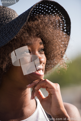 Image of Close up portrait of a beautiful young african american woman sm