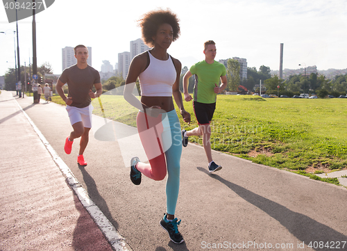 Image of multiethnic group of people on the jogging