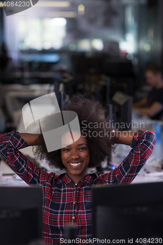 Image of portrait of a young successful African-American woman in modern 