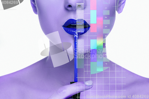 Image of Beautiful female lips with make-up and brush