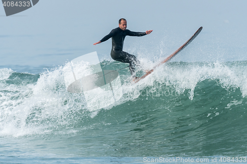 Image of Surfing the waves