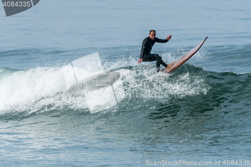 Image of Surfing the waves