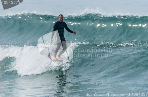 Image of Surfing the waves