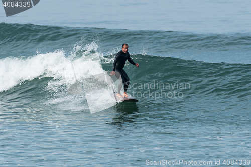 Image of Surfing the waves