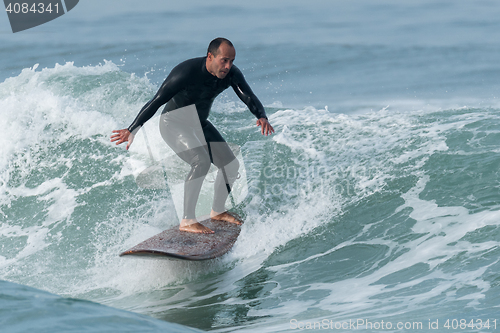 Image of Surfing the waves