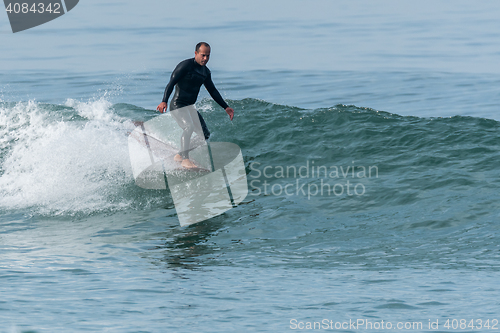 Image of Surfing the waves