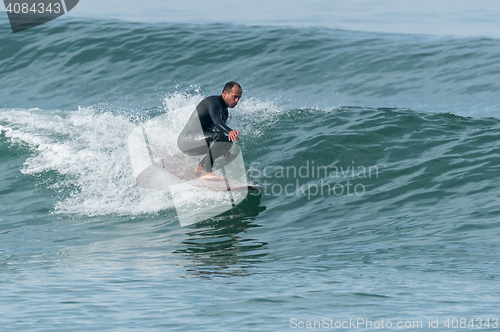 Image of Surfing the waves