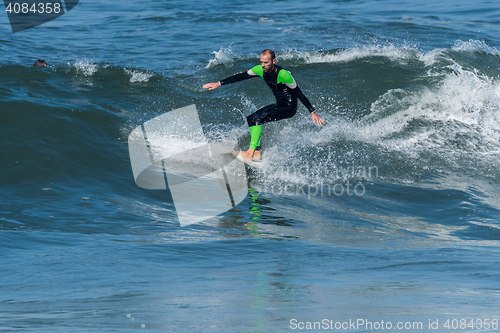 Image of Surfing the waves