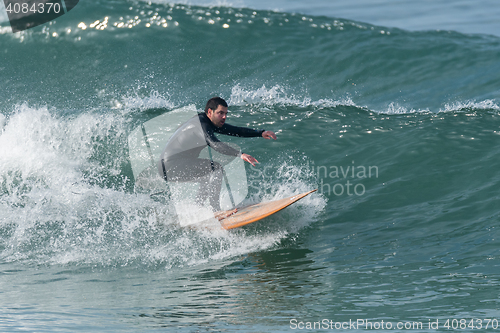 Image of Surfing the waves