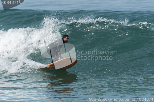 Image of Surfing the waves