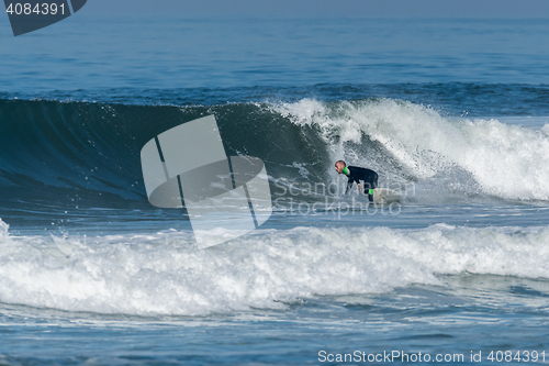 Image of Surfing the waves