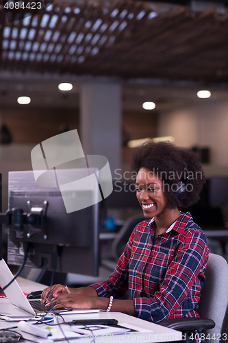 Image of portrait of a young successful African-American woman in modern 