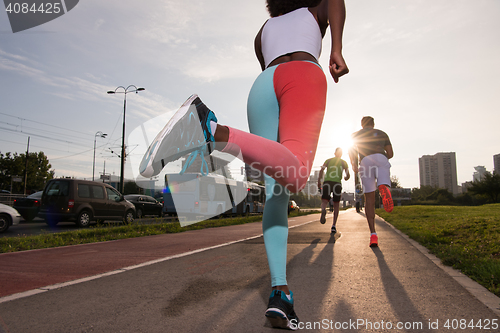 Image of multiethnic group of people on the jogging