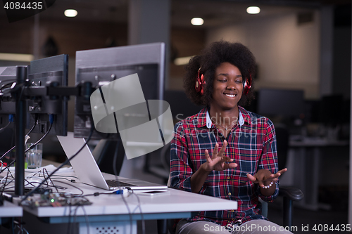 Image of portrait of a young successful African-American woman in modern 