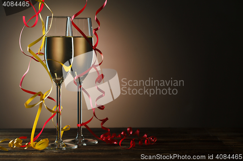 Image of Two glasses of champagne ready to party