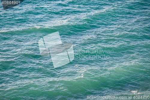 Image of Turquoise clear water and small waves