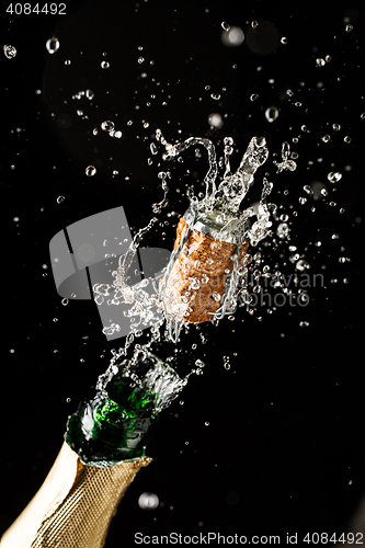 Image of Champagne closeup from exploding bottles