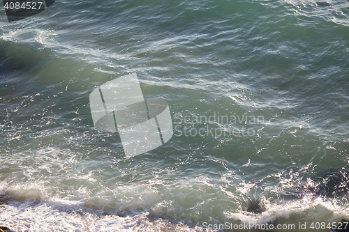 Image of Turquoise sea waves near the shoreline