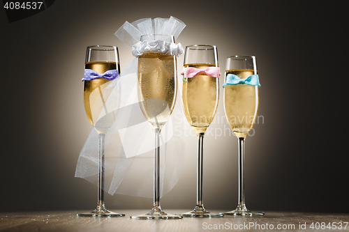 Image of Set of four elegant stylish champagne glasses. Hen-party concept