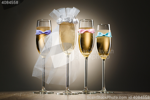 Image of Four elegant stylish champagne glasses. Bachelorette party concept