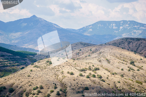 Image of Panoramic views of landscape with plants and rocky mountain peaks